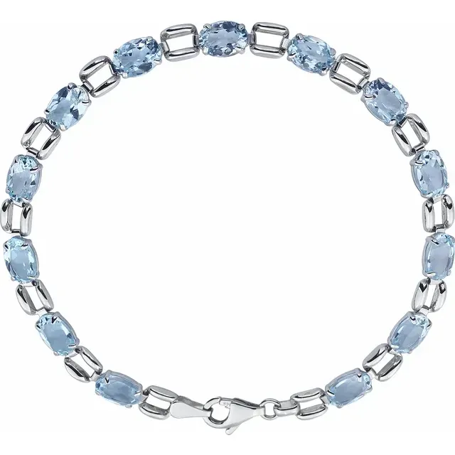 Cultural Pride Just Released 14K White 7x5 mm Oval Sky Blue Topaz 7" Bracelet