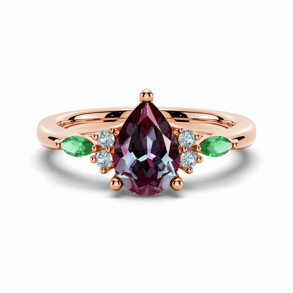 Morning Light 1.5 CT. Pear Shaped Alexandrite Engagement Ring With Emerald Accents