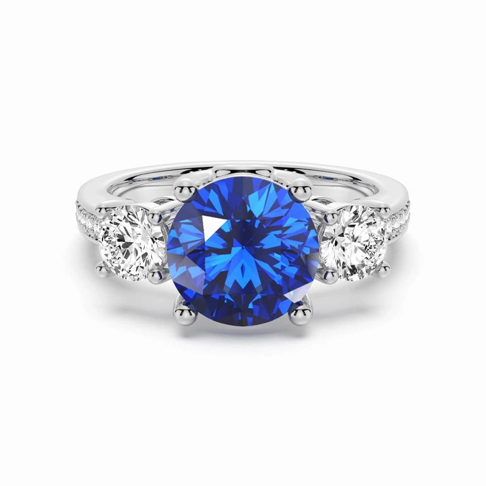 Gentle Spark Dazzling Touch 2.5 CT. Classic Blue Sapphire and White Sapphire Three Stone Ring