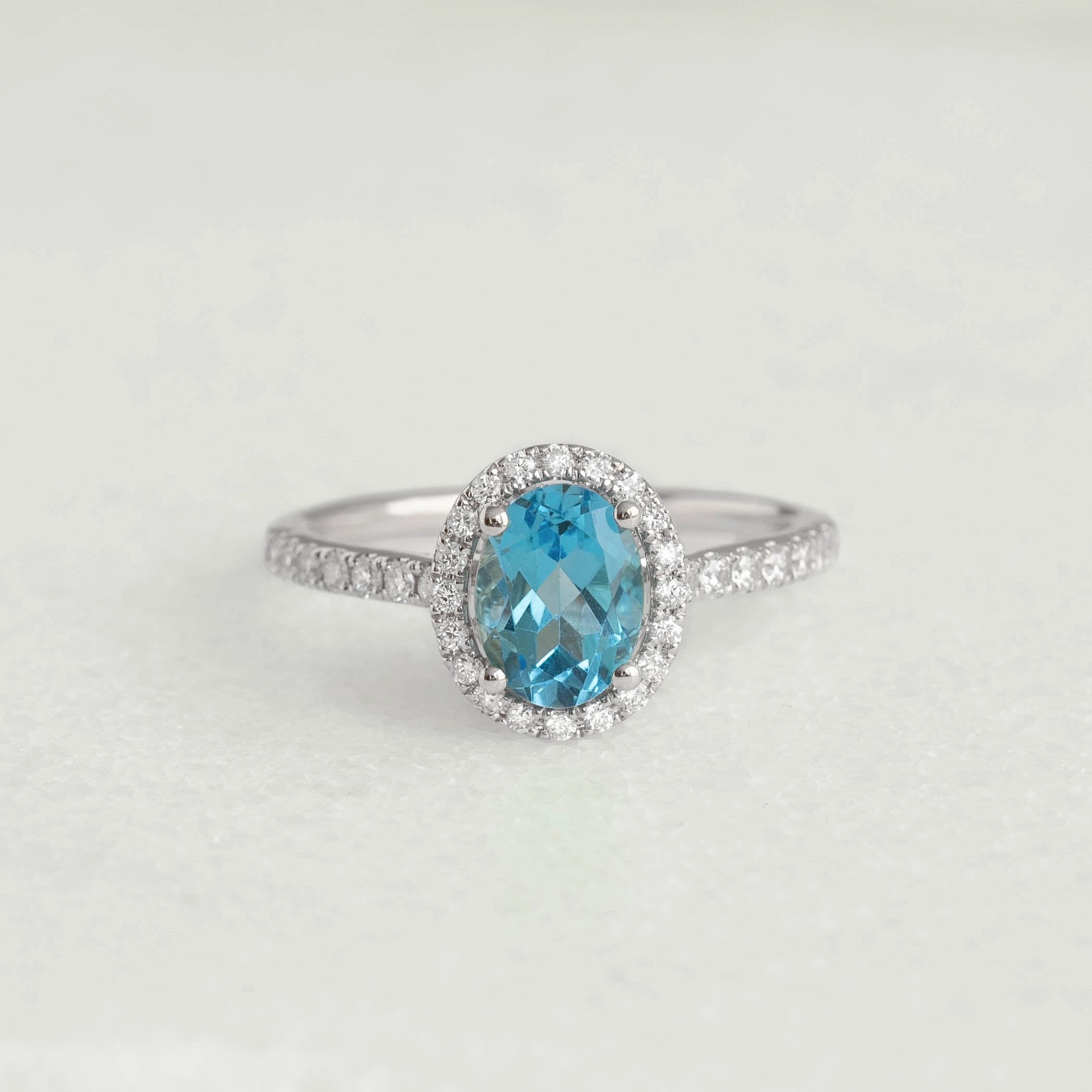 Bold Shine Pieces Oval Swiss Blue Topaz Halo Ring White Gold - Suna