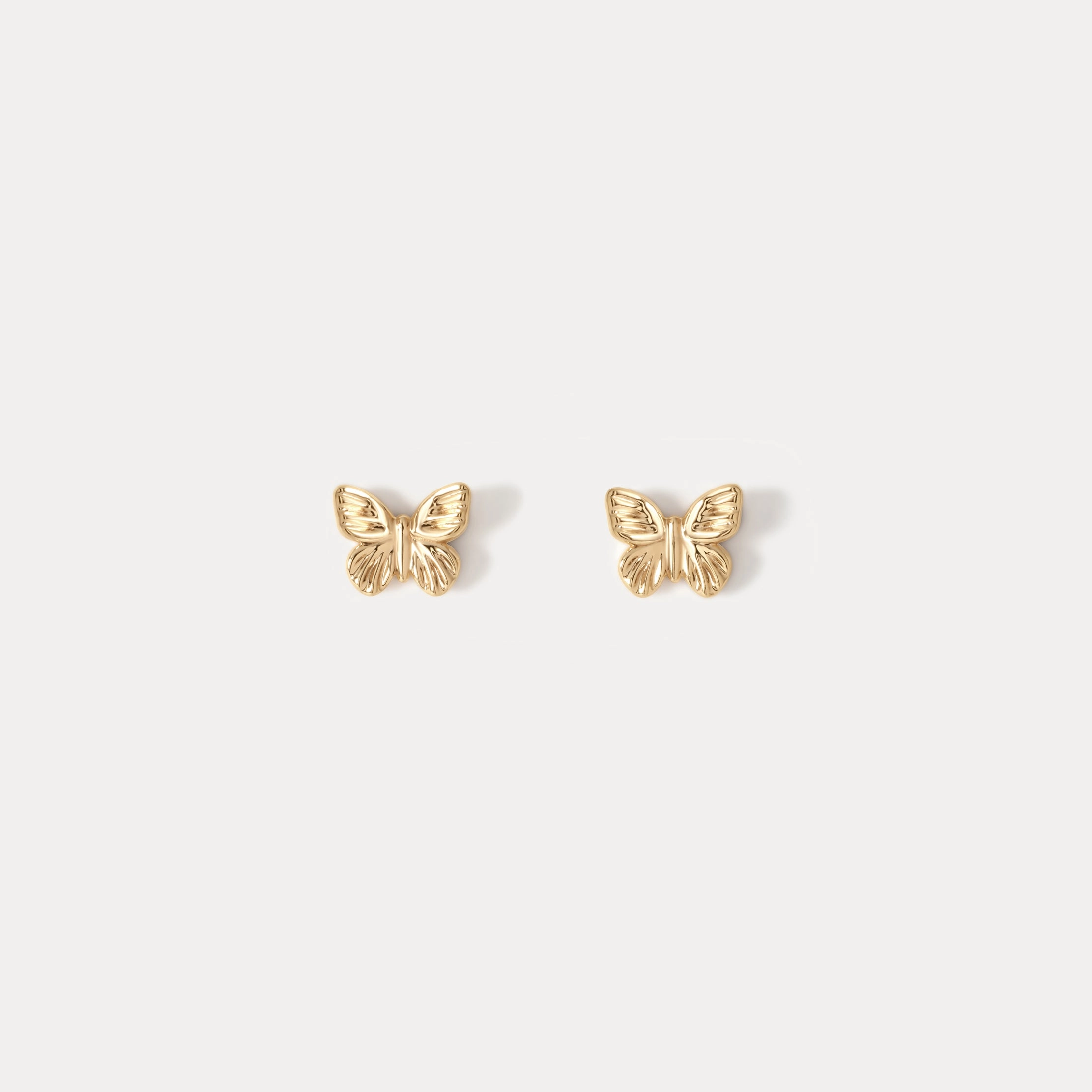 Butterfly Studs Structured Shape Flawless Glow