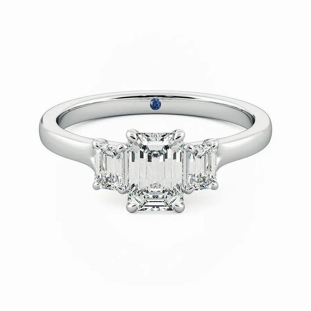 Four Prong Three Stone Emerald Cut Moissanite Engagement Ring with Hidden Anniversary Stone Accent Everyday Edge