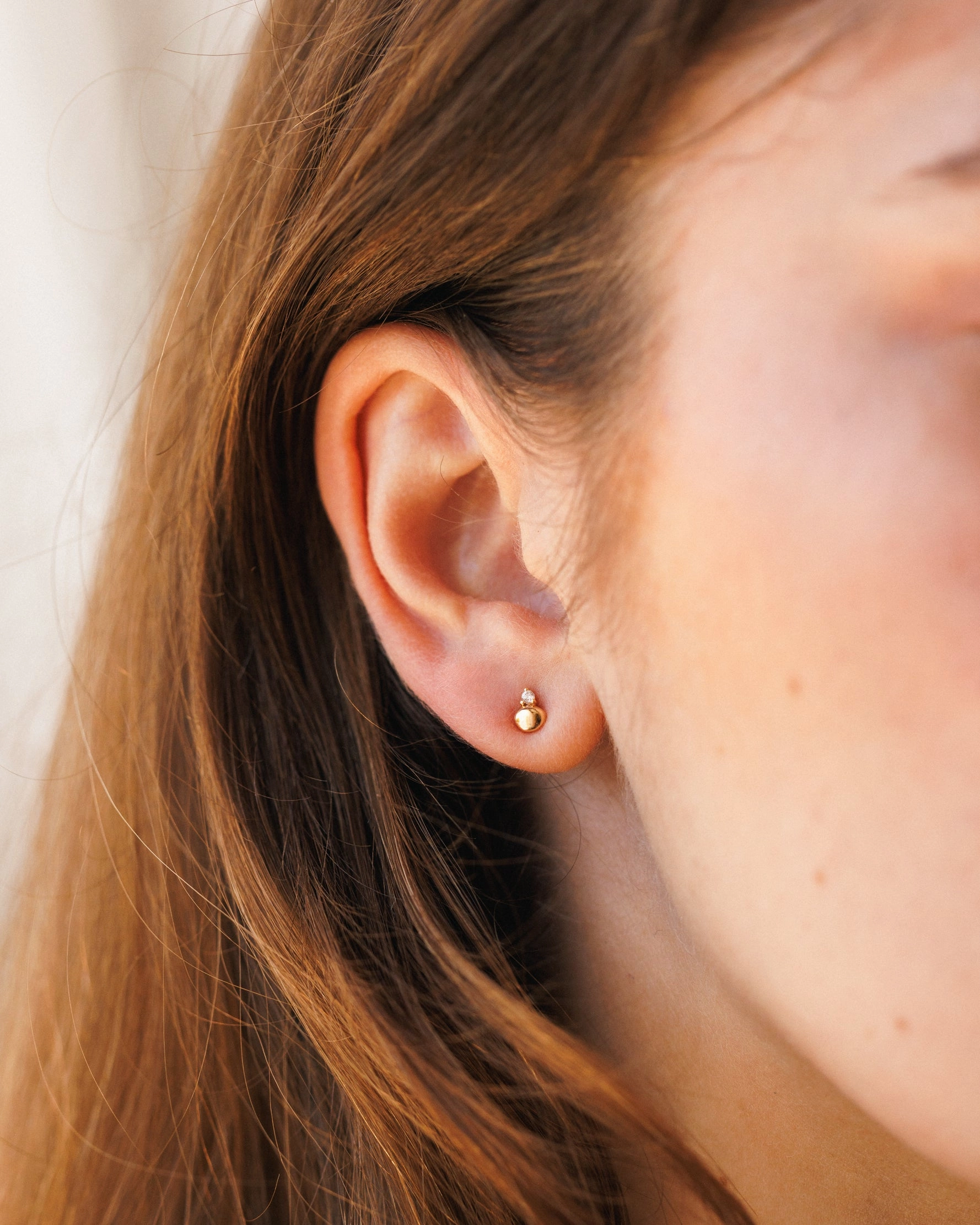Gleaming Pebble Studs Refined Highlight