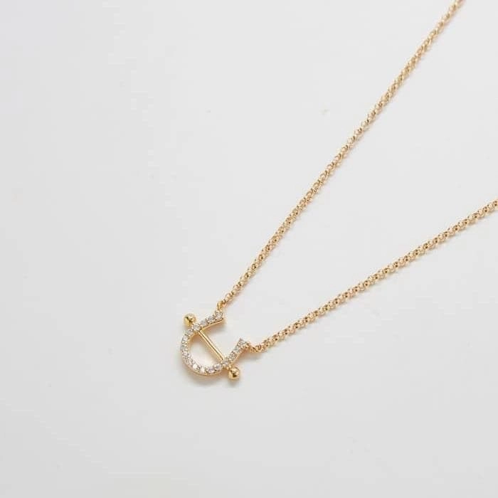 Gold Pave Horseshoe Necklace Balanced Highlight
