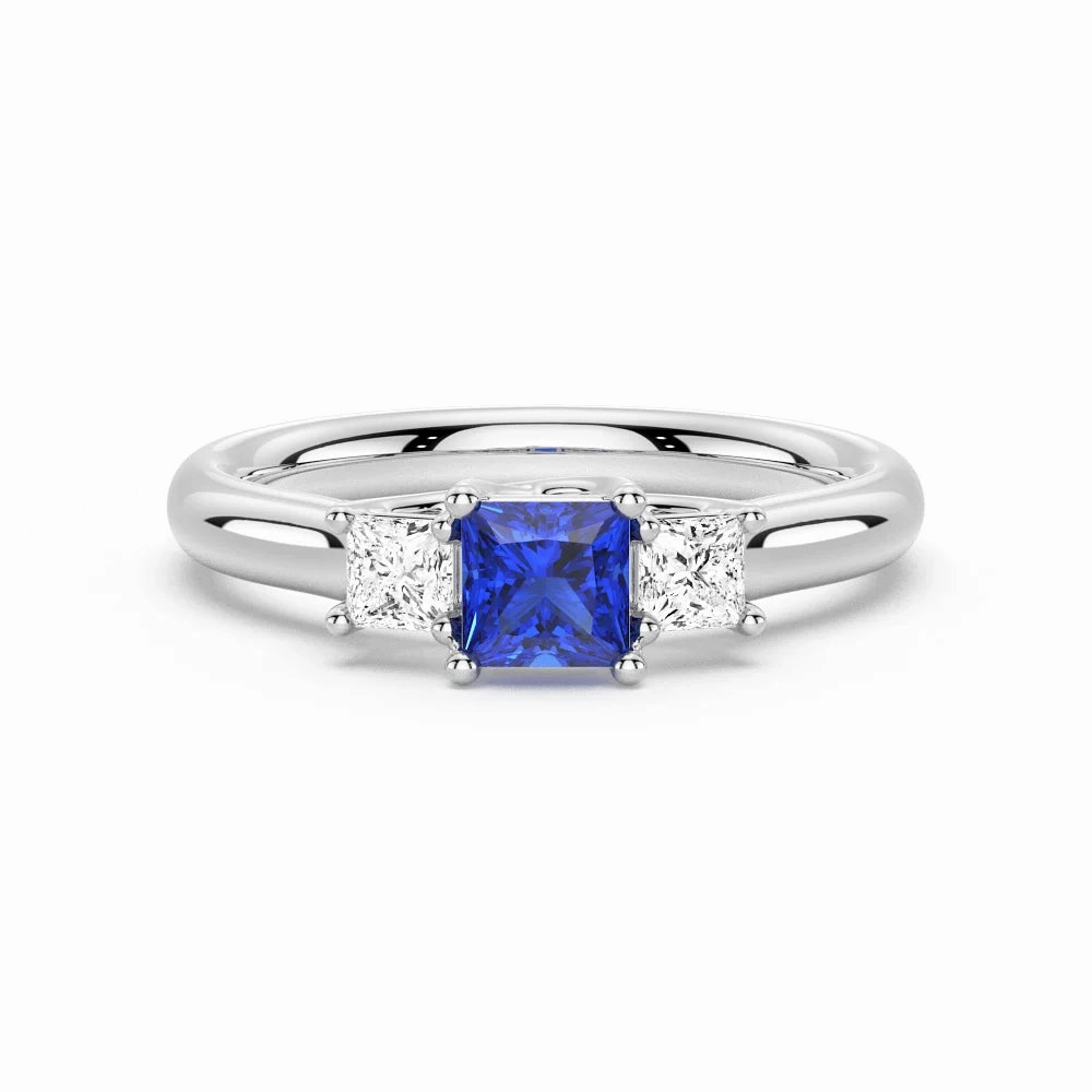 Favorite Accent Sophisticated Glow Lab Grown Sapphire and Princess Cut Diamond Three Stone Ring