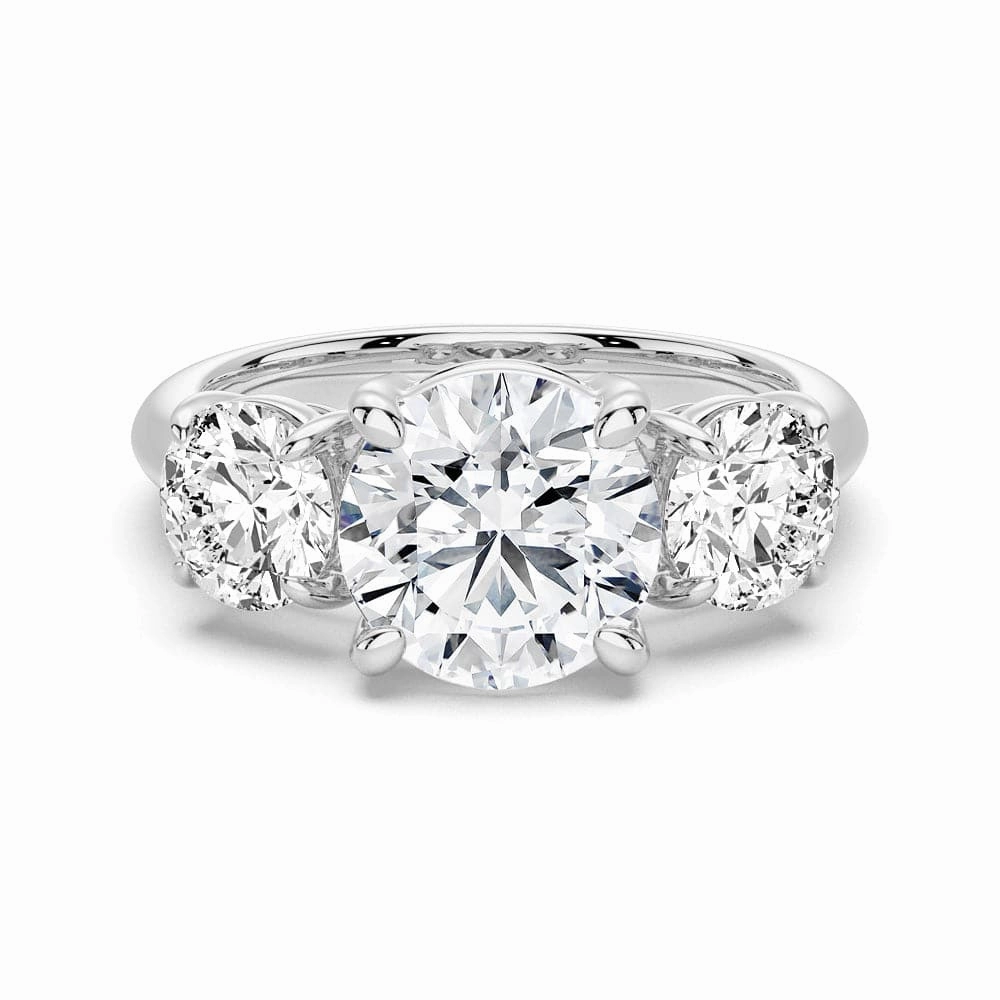 Vogue Accent Round Cut Three Stone Moissanite Engagement Ring