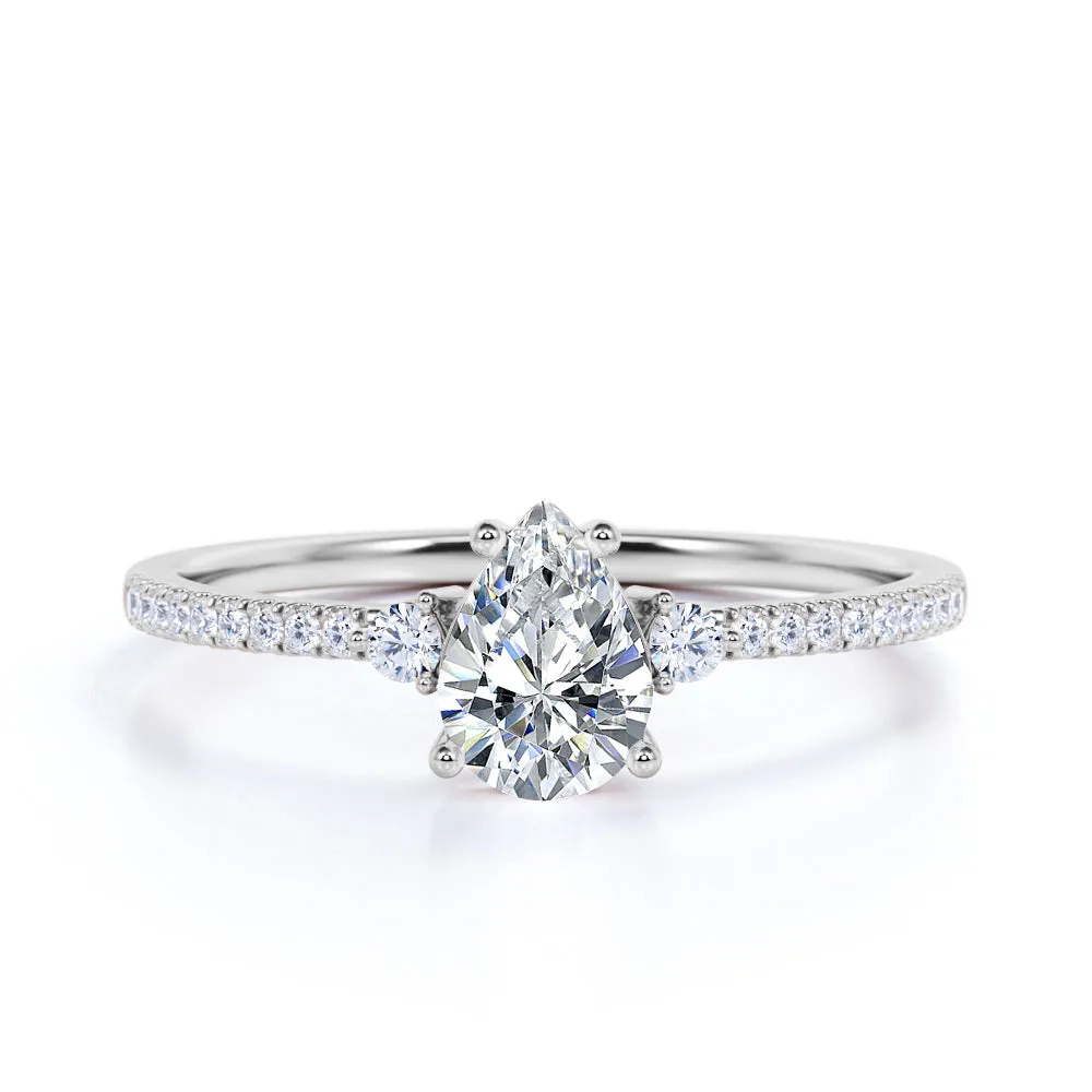 Pave Set 1.50 Carat Pear Moissanite Engagement Ring Understated Style Understated Elegance