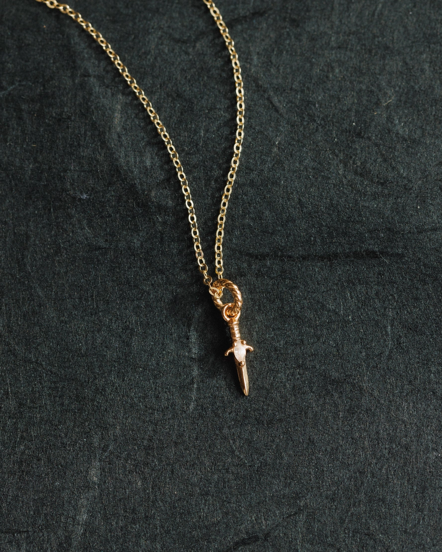 Moonstone Dagger Charm Glow Vibe