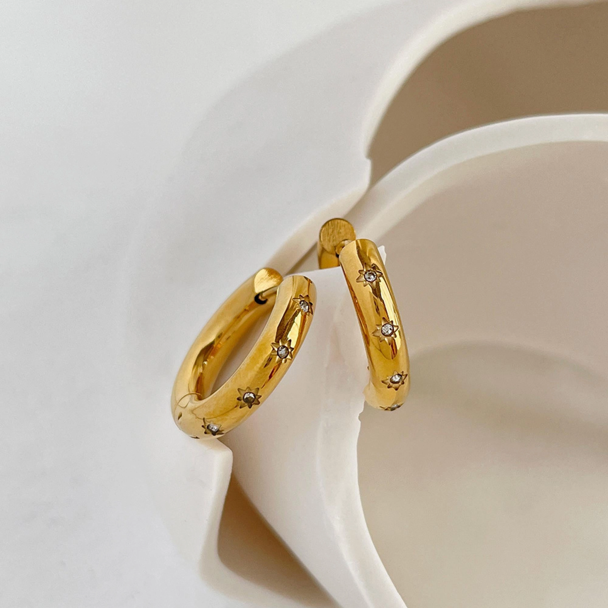 Versatile Charm Balanced Form North Star Huggies Hoop 18K Gold | Radiating Sun Ray Gems, Gold Statement CZ Earrings, Celestial Hoops, Dainty CZ Hoop Earrings