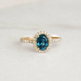 Luxury Spark Modern Detailing Oval London Blue Topaz Halo Ring 14k Gold - Suna