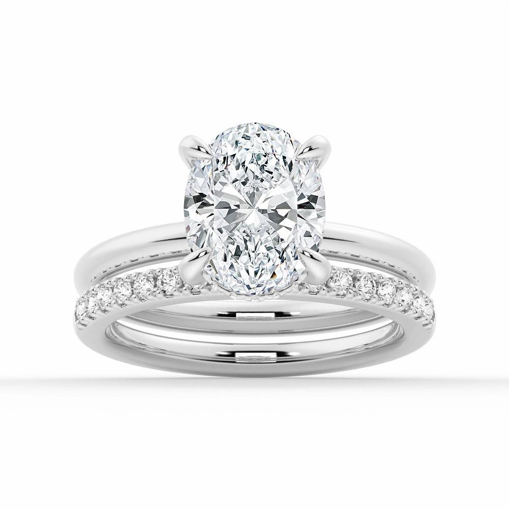 Oval Solitaire Hidden Halo Moissanite Ring Set with Matching Wedding Band Artisan Edge Bright Highlight