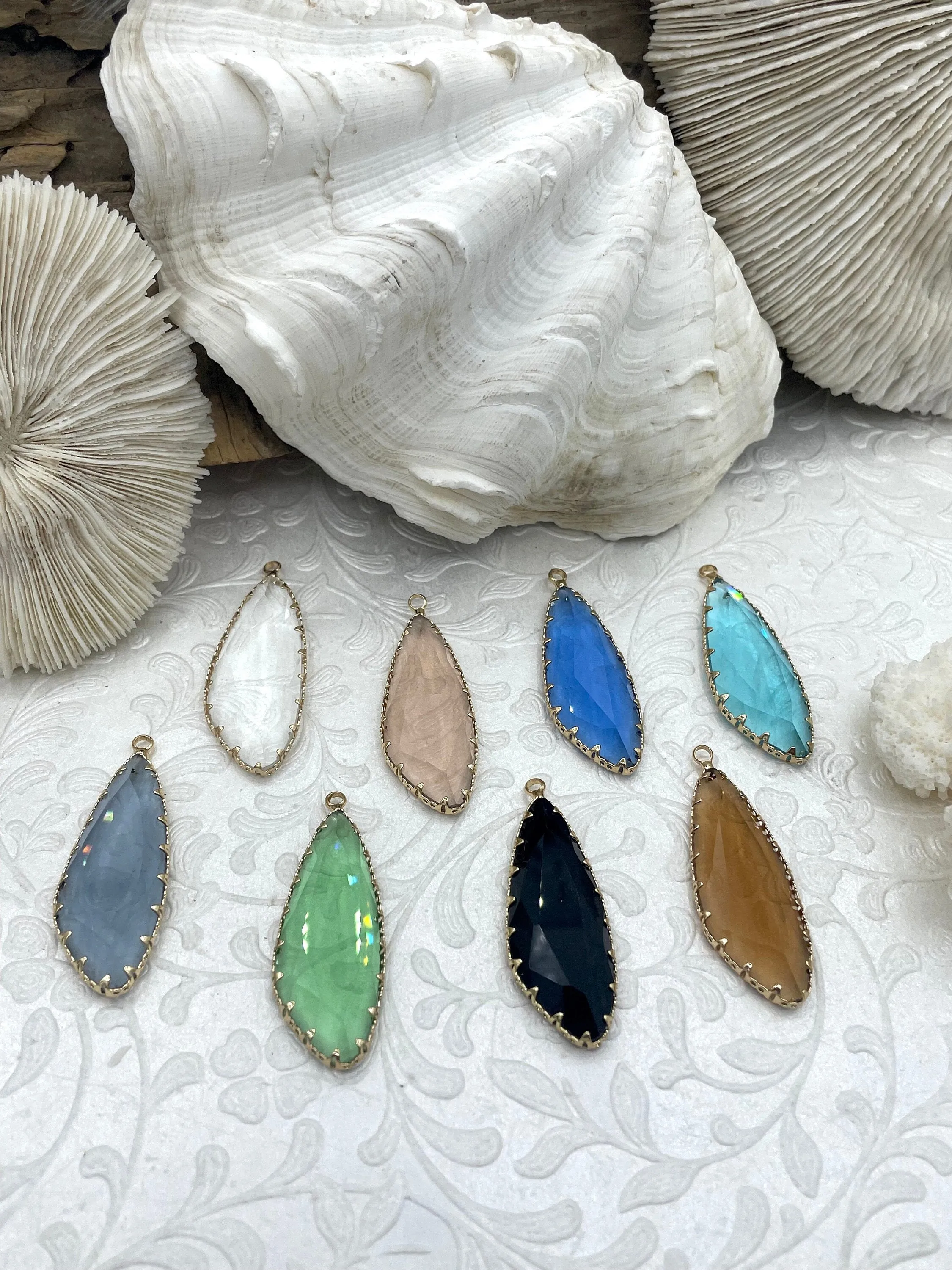 Gold Trimmed Colorful Crystal Drop Gold trimmed Pendants Gold Trimmed Crystal Charms. Colorful Crystal Charms 8 Styles, Fast Ship Budget-Friendly Design