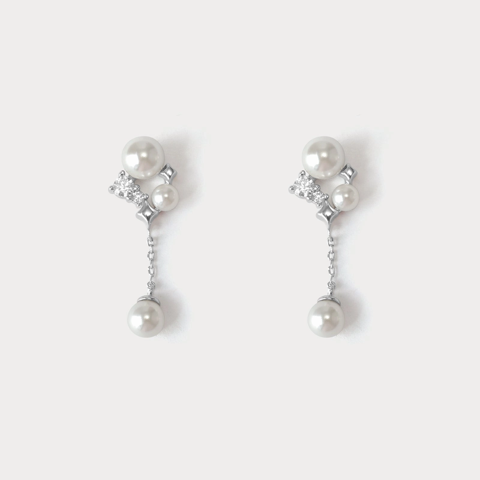 Radiant Finish Silver Star Pearl Earrings