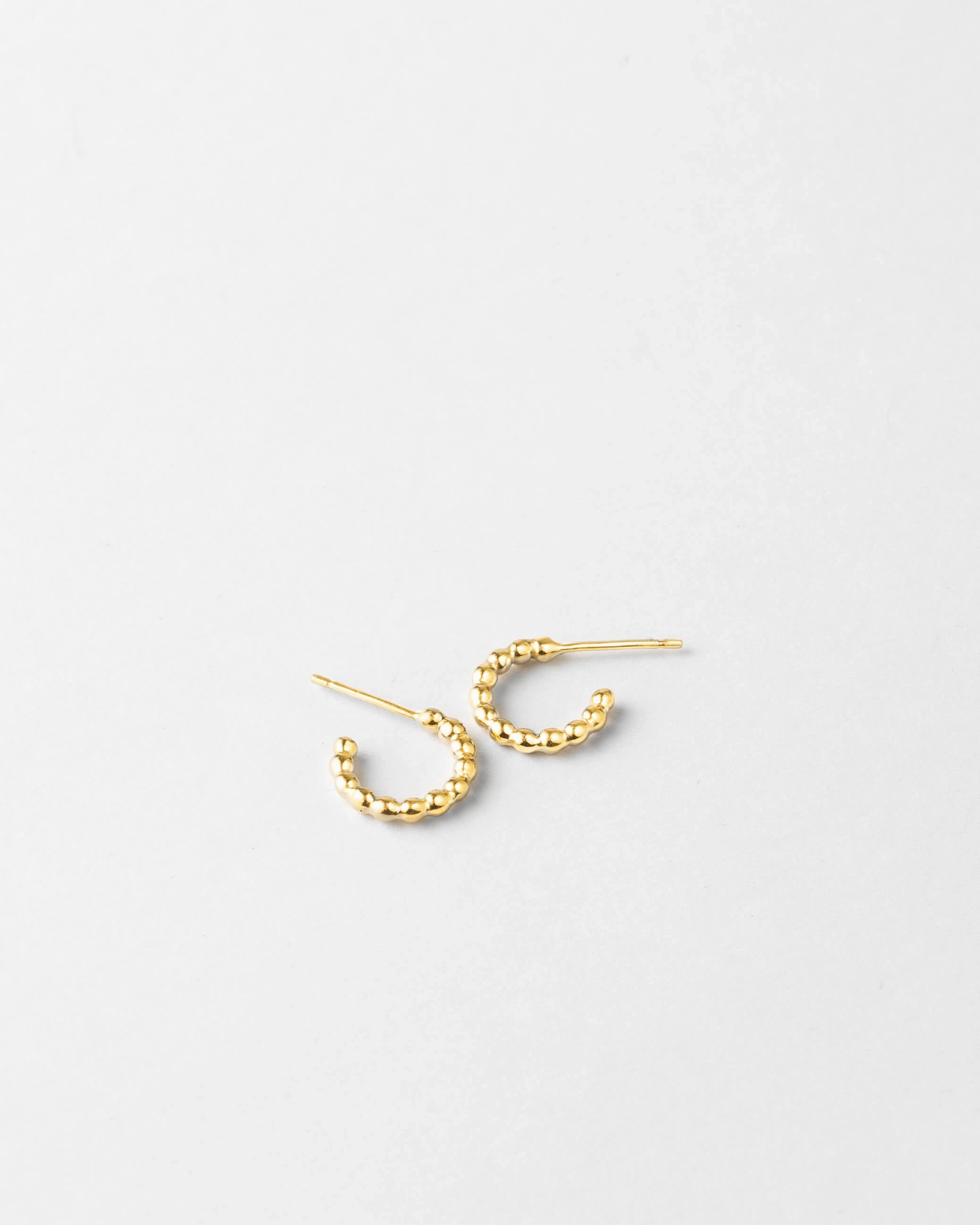 Telkes Huggie Hoops Elegant Beauty Timeless Jewelry