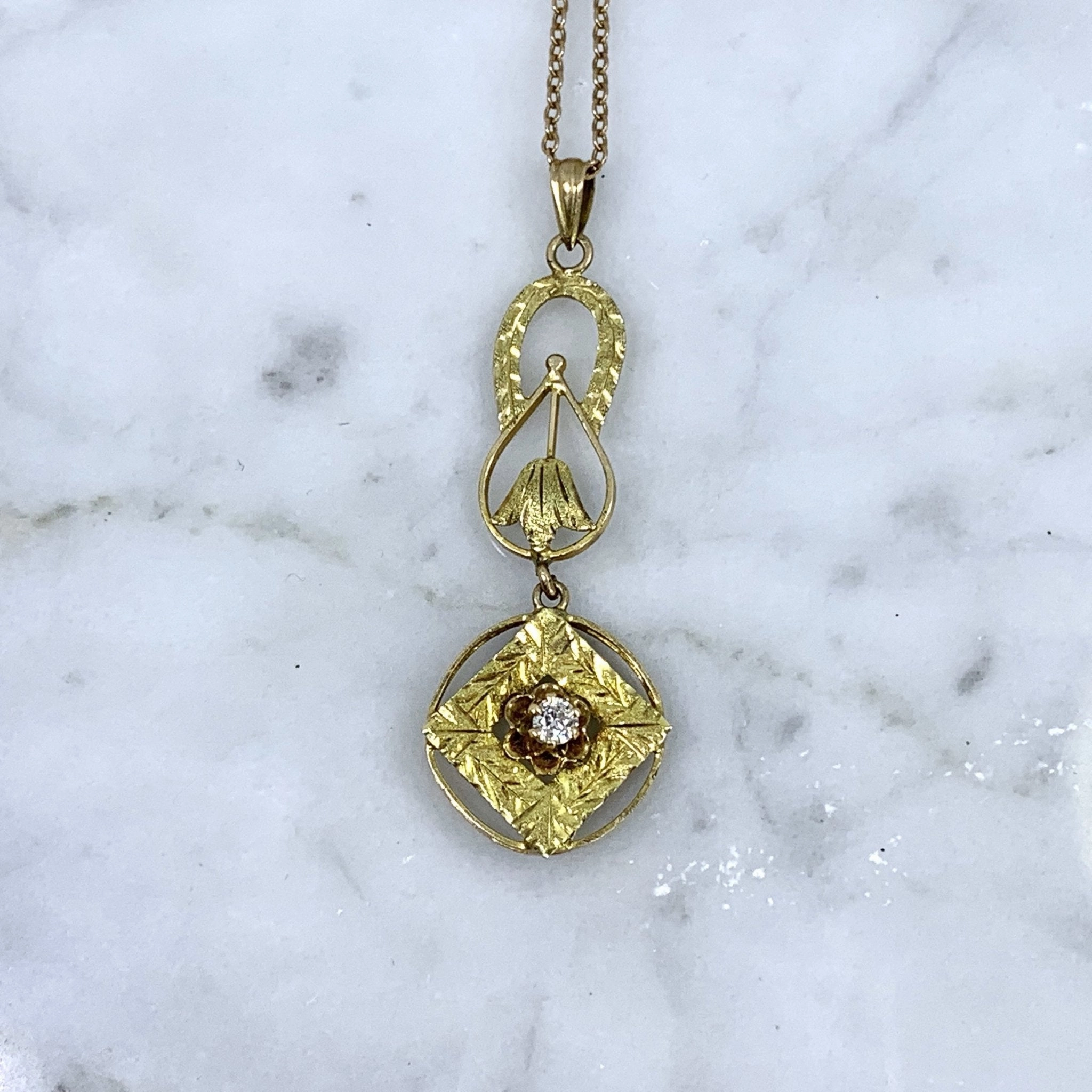 1930s Diamond Pendant in 10K Yellow Gold Filigree. Drop Pendant with Art Nouveau Style. Polished Glow Soft Materials