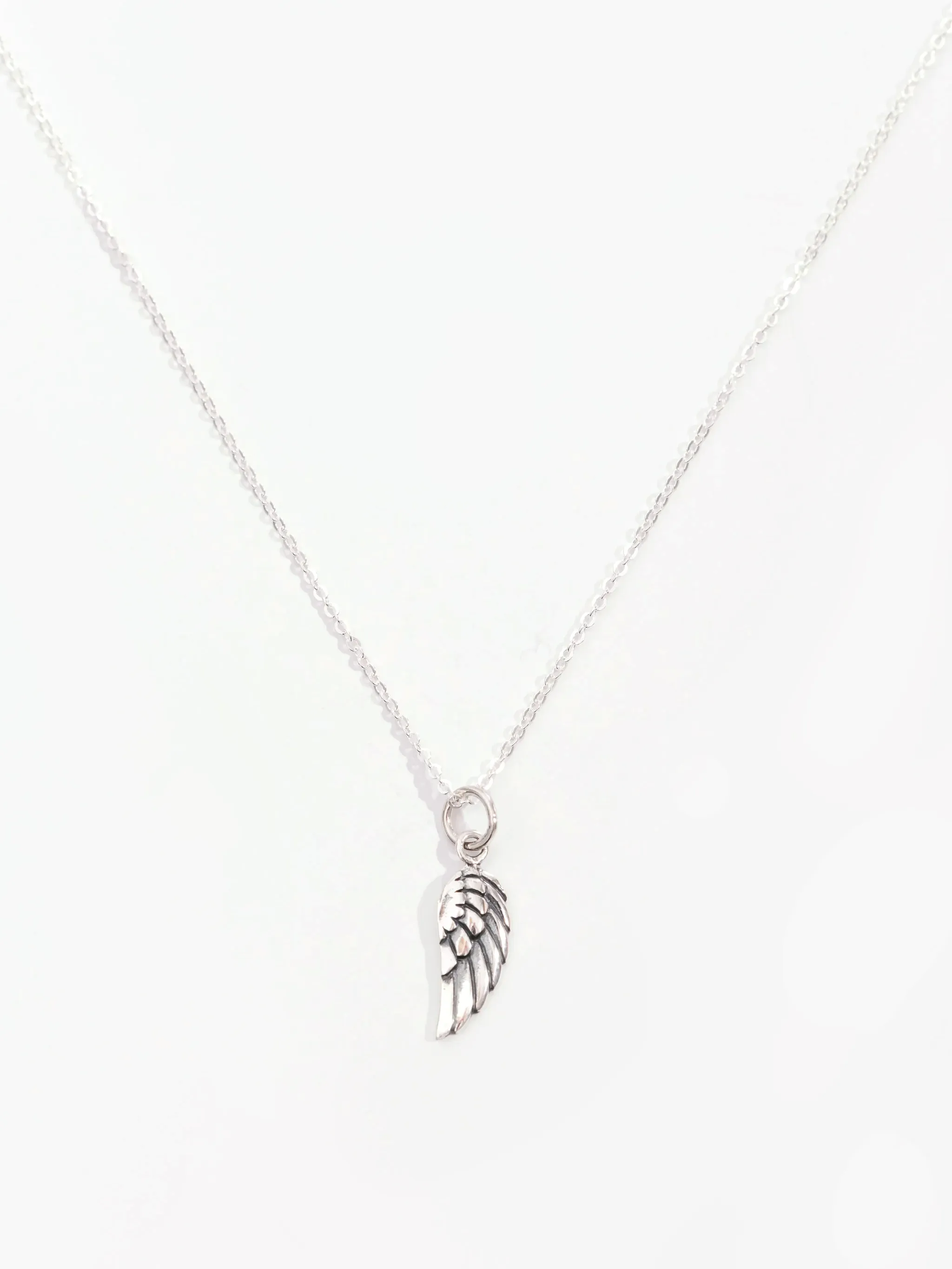 Wing Pendant Layered Glow